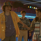 Will, Eleven and Mike roller skate